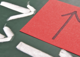 three white arrows point to the right, one red square with black arrow, pointing to the top