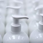 white plastic bottles with pump